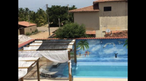 Casa Temporada Frente à Praia Piscina Ar cond Nova Viçosa VA